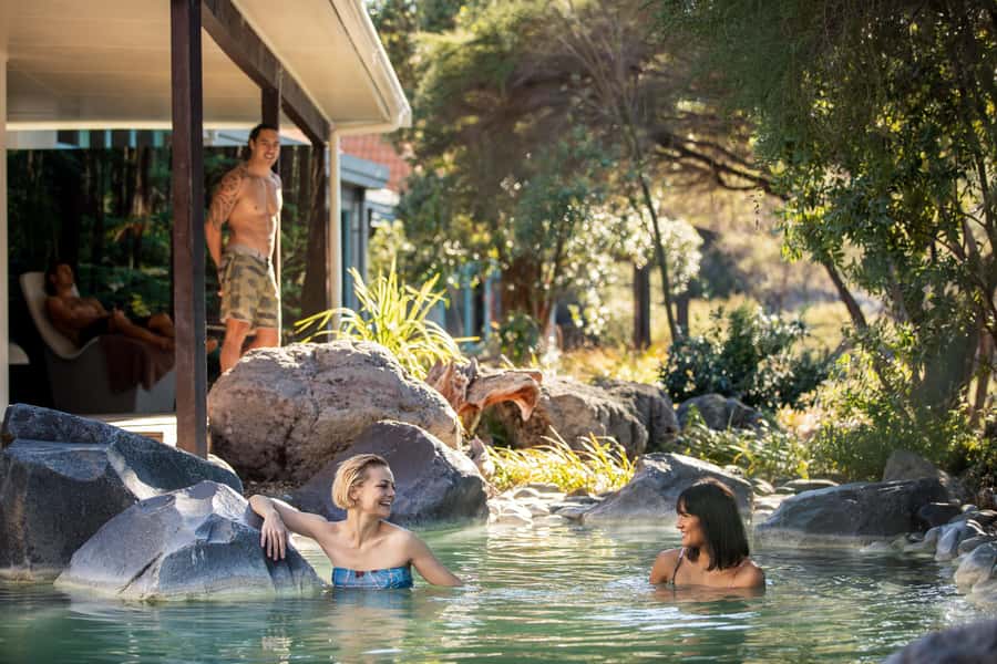 Auckland: Rotorua Highlights inc Wai-O-Tapu & Polynesian Spa - Rotorua sights from the vehicle