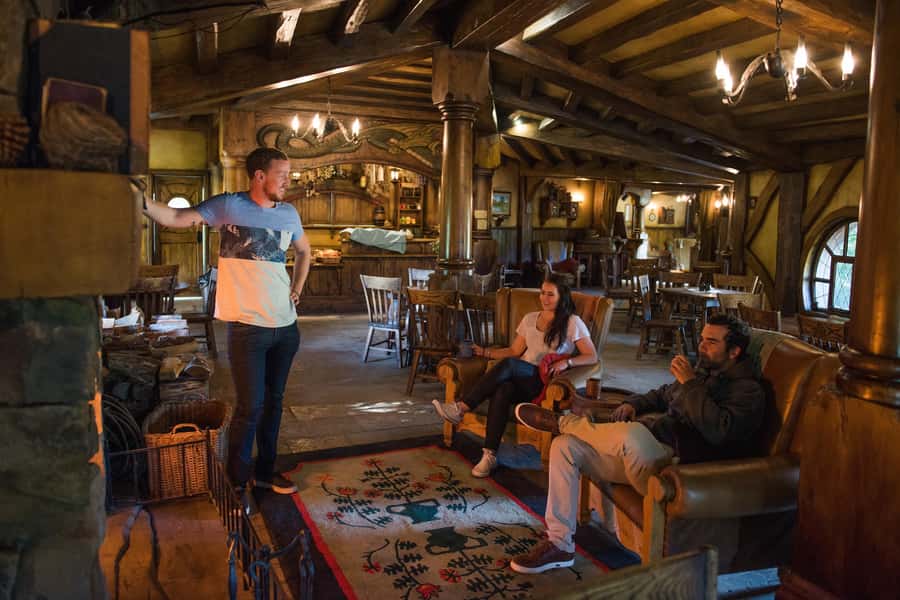 From Auckland: Hobbiton & Waitomo Caves Full-Day Trip - Walking through the Hobbiton Movie Set
