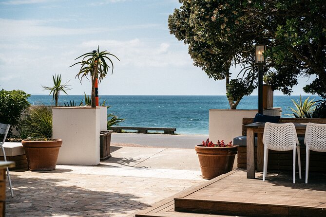 Private Essence of Waiheke Wine Tour - Mudbrick Vineyard, sea views, and the main meal
