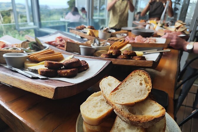 Waiheke Island: Scenic Wine Tour on a Double Decker Bus - Mudbrick Vineyard provides the grand finish