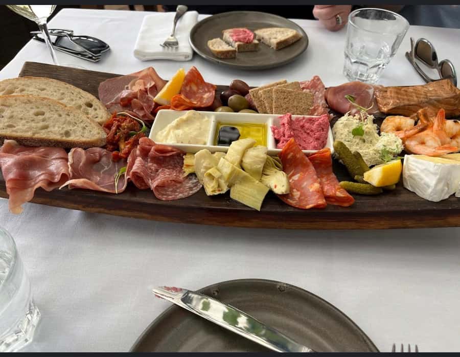 Waiheke: Scenic Taste and Graze Tour with Wine, Whisky, Beer - Stonyridge and the platter lunch